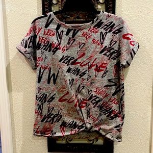 XS tee top multi colors . Excellent condition